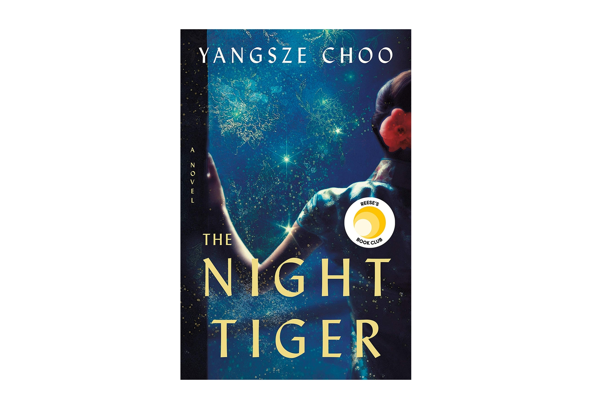 Book cover for "The Night Tiger" by Yangsze Choo, shows a woman leaning on a doorway, her arm bent as she leans, wearing a short-sleeved frock, with a flower in her tied-back hair. In front of her is a darkened blue landscape with flashes of light. 