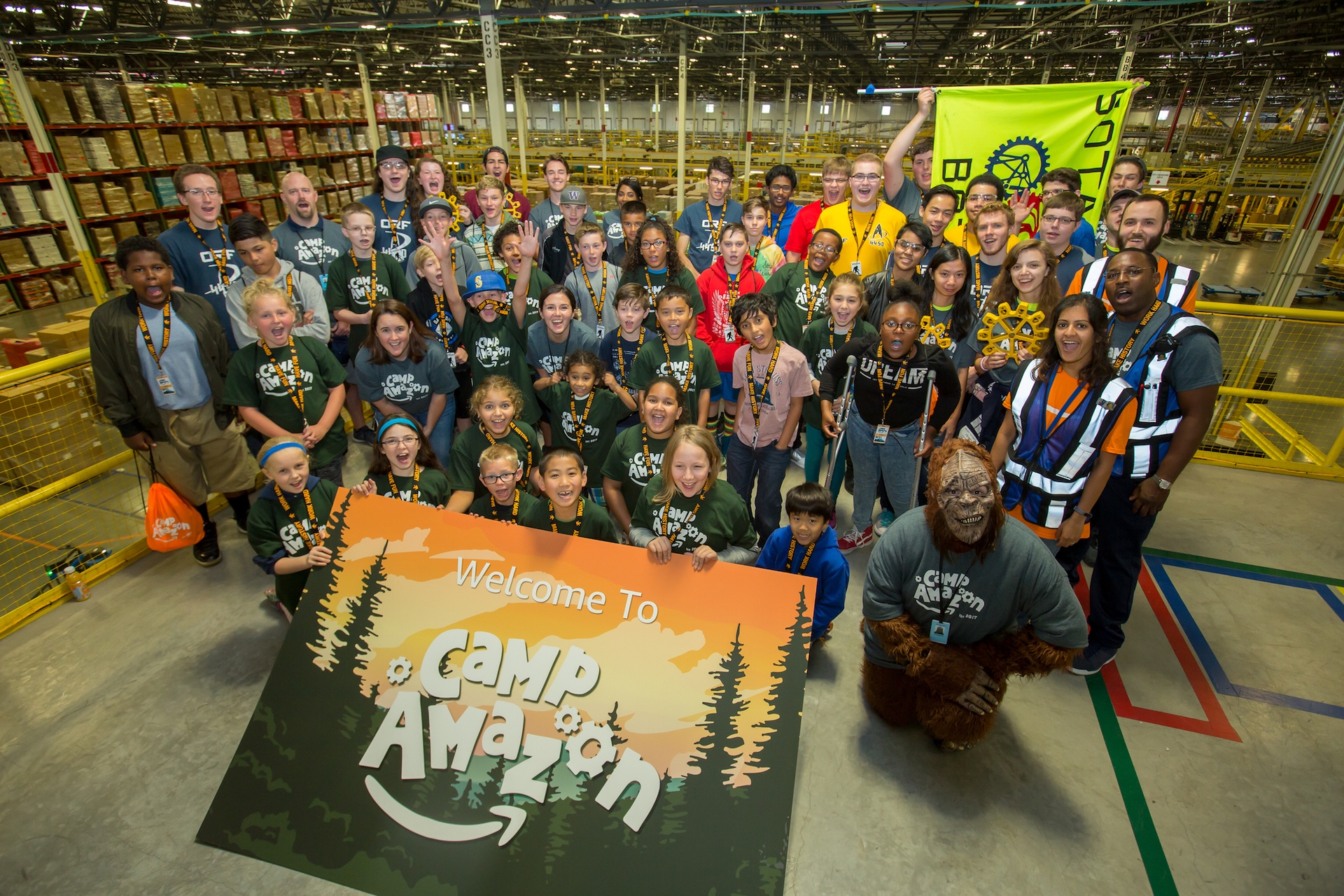 Students participate in a Camp Amazon event at a fulfillment center in Washington