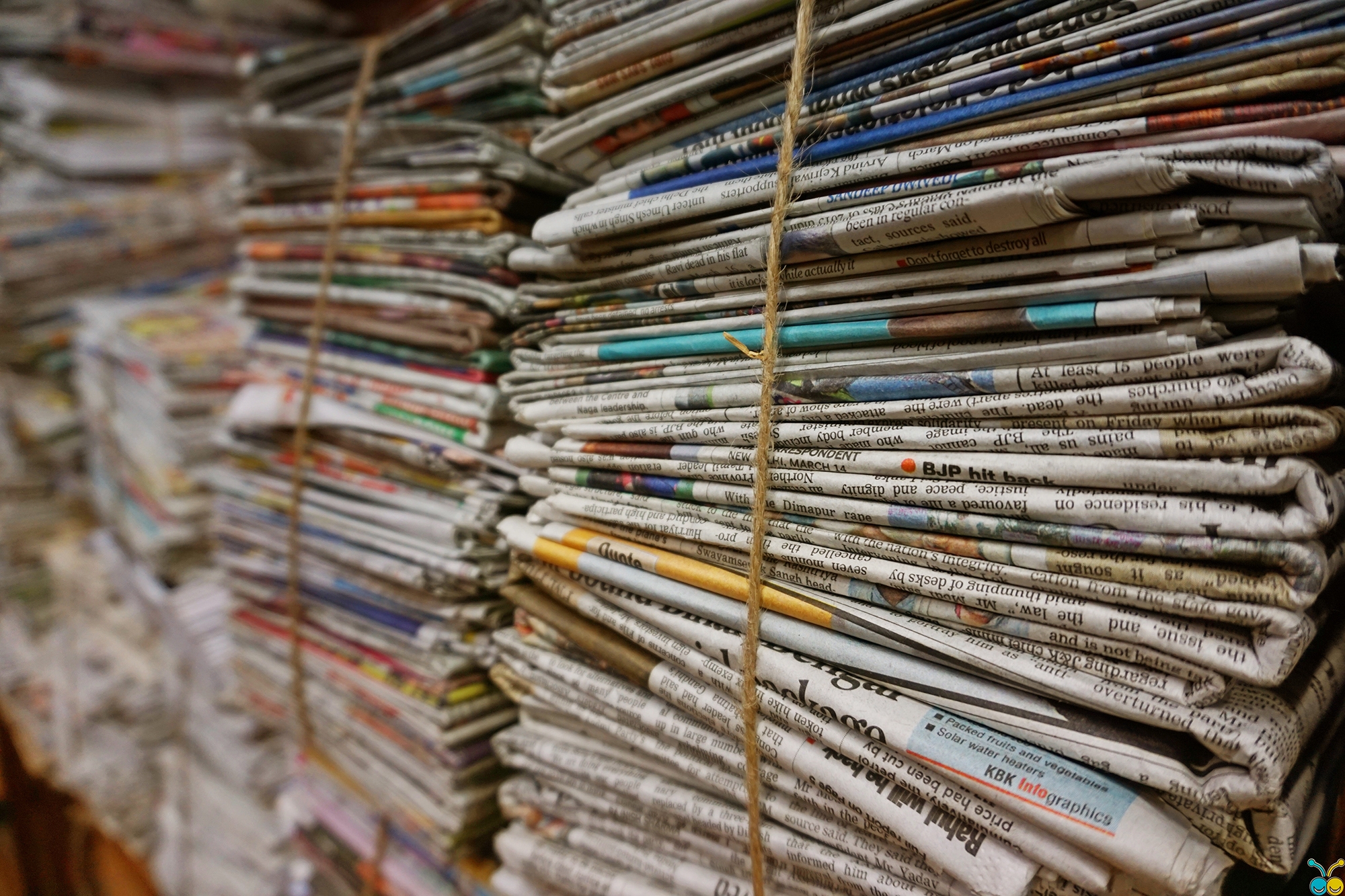 Stacks of newspapers bundled together