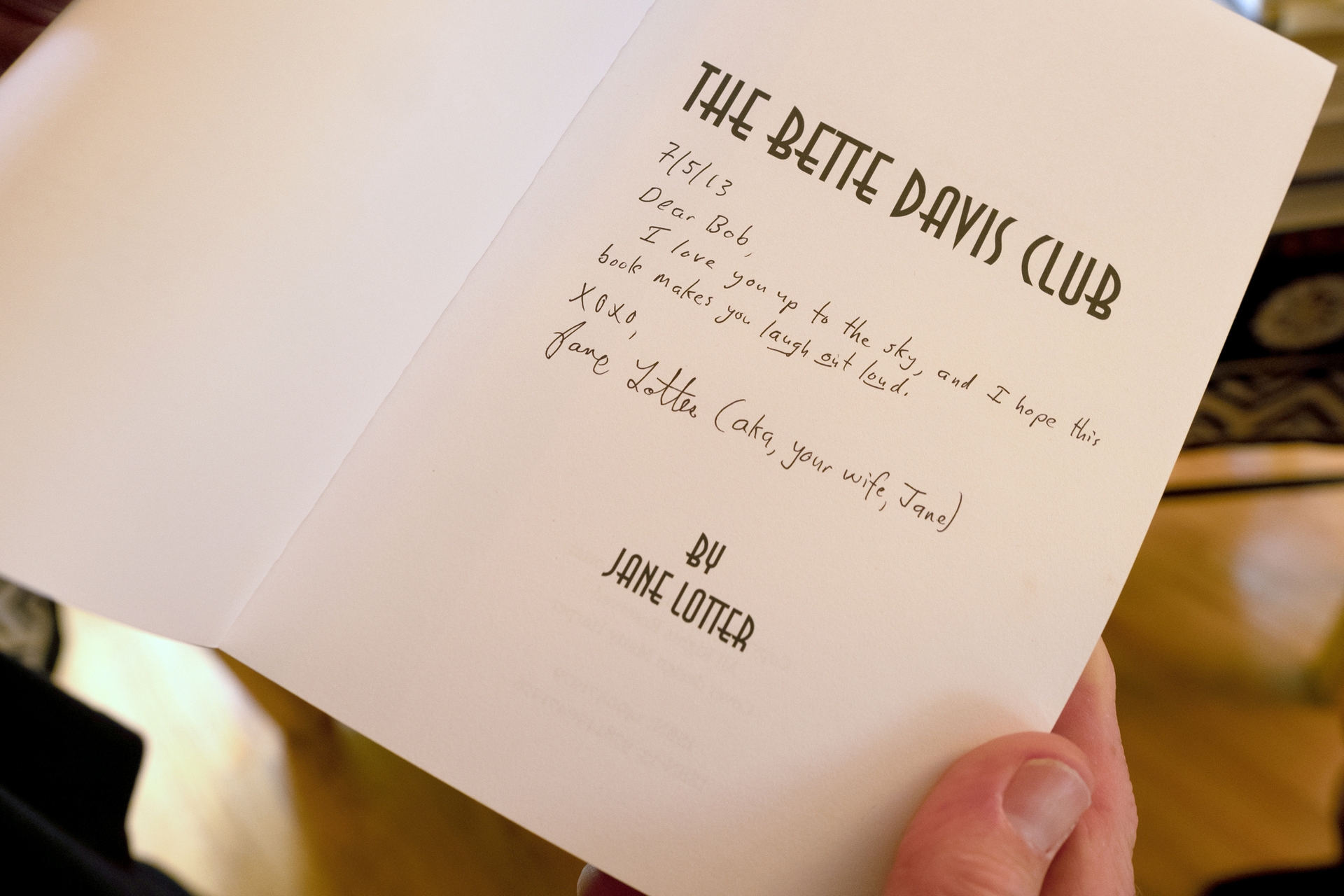 The inside cover of The Bette Davis Club, with a handwritten note to the author's husband. 