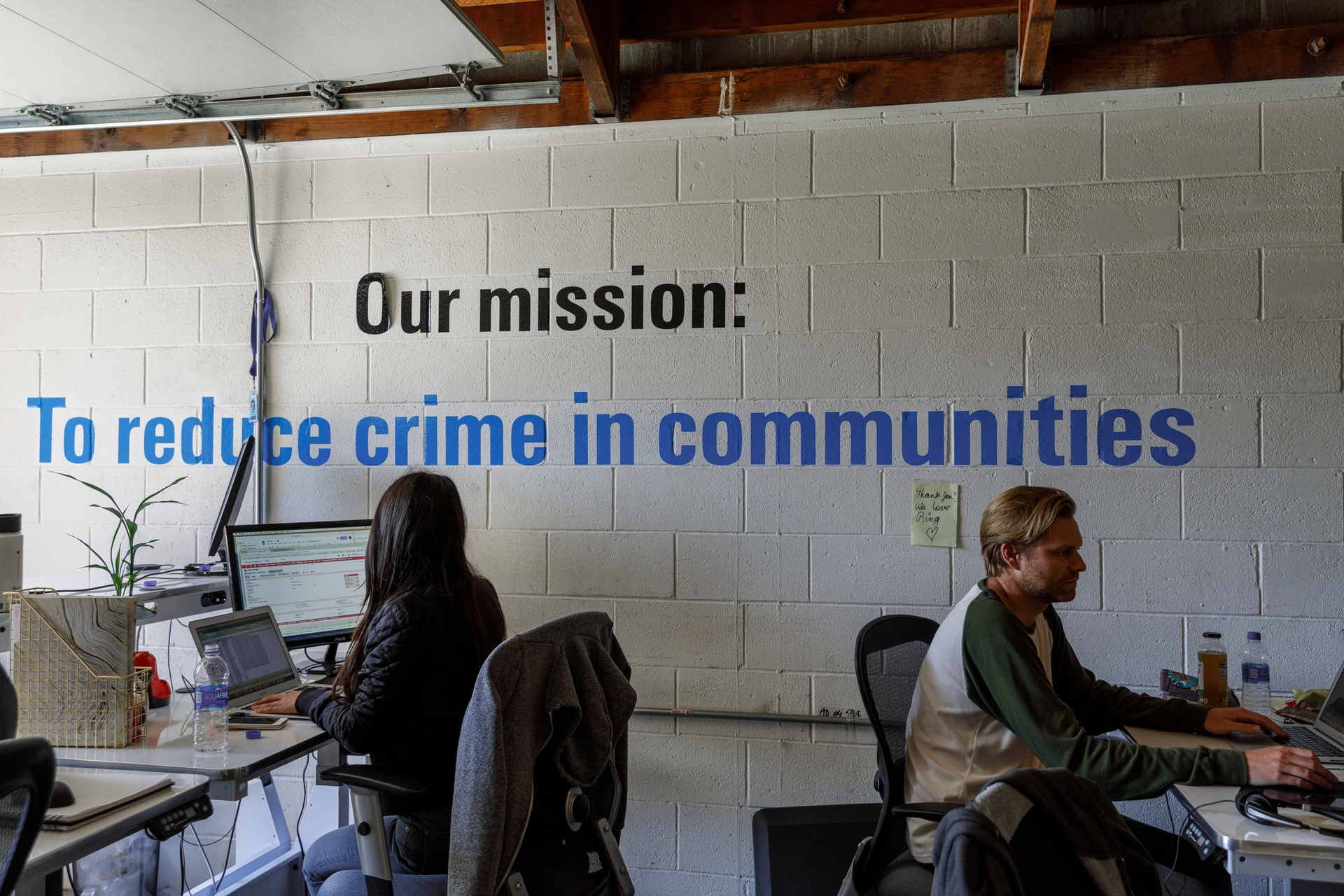 Wall art at Ring headquarters reads 'Our mission: To reduce crime in communities.'